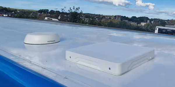 The top of a bus where Dragon WiFi has installed a remote communications module for providing WiFi on buses